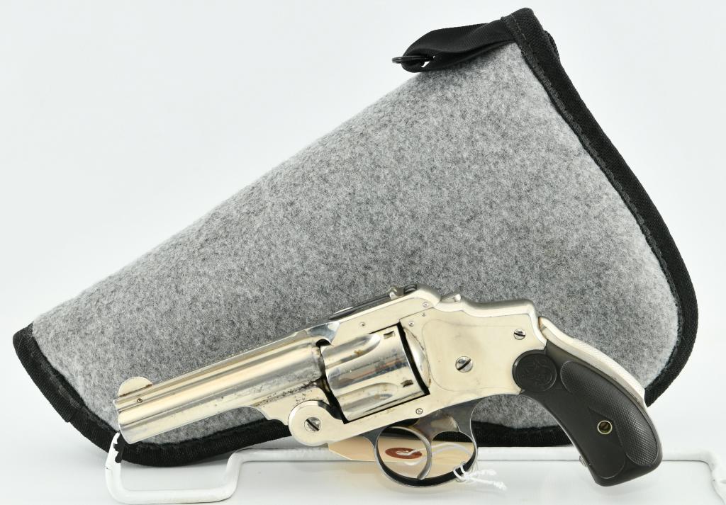 Smith & Wesson Safety Hammerless 1st Model .38: Here We Have a Smith & Wesson Safety Hammerless 1st Model Lemon Squeezer Revolver Chambered in .38 S&W, Nickel Finish, 3 1/4" Barrel, Black Hard Rubber Grips With S&W Monogram. Overall in Great Condit