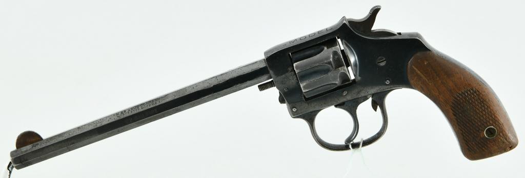 H&R Trapper Model .22 Rim Fire Revolver: Here we have a Harrington & Richardson Trapper Model Revolver, Chambered in .22 LR With a Seven Shot Cylinder, 6" Hex Barrel, Wood Grips, Half Moon Front Sight, Notched Rear Sights. and Overall in Goo