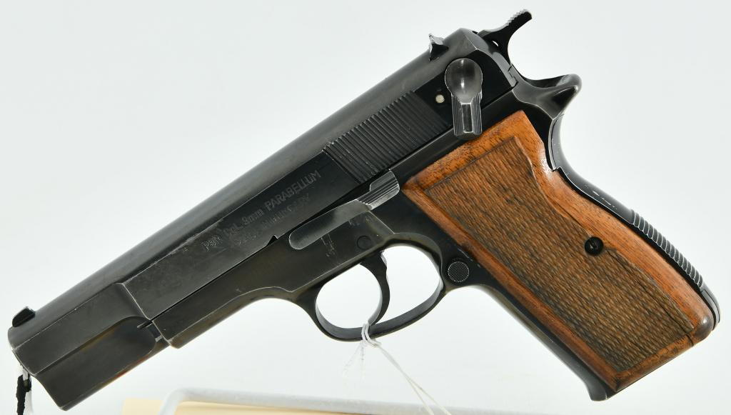 Hungarian FEG Model P9R Semi Auto 9MM: Up Next We Have a Hungarian FEG Model P9R Which is a Browning Hi Power clone manufactured in Hungary circa 1970s with original blue finish and checkered walnut grips. Fixed sights, No magazine. Matchi