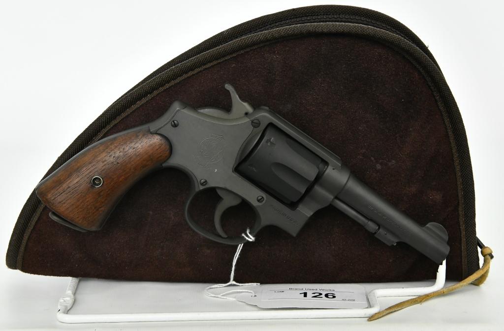 Smith & Wesson Victory Revolver U.S. Property Mark: Up Next We Have a Parkerized Smith & Wesson Victory Revolver With all Matching Numbers, Including The Grips! Chambered in .38 Special, It has a 4" Barrel, Serial #V121698. It Has The Flaming Bomb Ordi