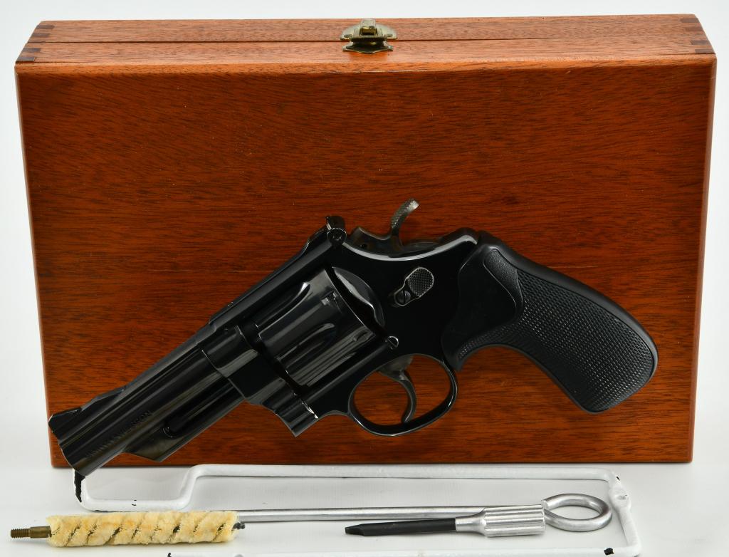 Smith & Wesson Model 25-2 .45 Cal 1955 Revolver: Up Next We Have a Mint Smith & Wesson Model 25-2 Model 1955 Revolver Chambered in .45 ACP, It has a 4" barrel, And Comes in a Wood Presentation Case, Pachmayr Grips, Overall in Excellent Condition!