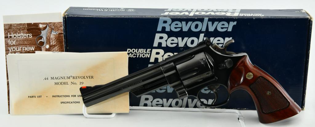 Mint Smith & Wesson Model 29-2 .44 Magnum: Alright Dirty Harry fans, here you go! Here we Have a Pristine and Appears Unfired Smith & Wesson Model 29-2 Double Action Revolver, Chambered in .44 Magnum and boasts a 6" Barrel, Checkered Wood Fact