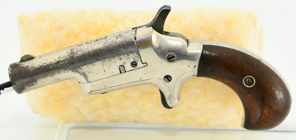 Colt Thuer Single Shot Derringer .41: Up Next is a 3rd Model Colt Derringer which is also known as the Thuer Model Derringer. Caliber is .41 Rimfire with 2.5" round barrel. Brass frame is nickel plated, Left side of frame marked .41 CAL. 