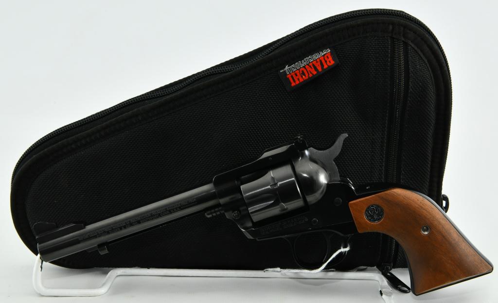 Ruger New Model Single Six .32 H&R Magnum Revolver: Up Next We Have a Ruger New Model Single Six Revolver Chambered For .32 H&R Magnum, 5 1/2" Barrel, Factory Smooth Wood Grips With Medallions, Overall in Excellent Condition, Serial # 650-05259 Dates t