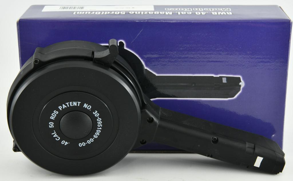 NIB Glock .40 Cal 50 Round Drum Magazine: NIB Glock .40 Cal 50 Round Drum Magazine, For All .40 Caliber Glock Handguns 50 Round Drum Magazine in .40 caliber for all double stack Glock .40 Caliber Pistols. These drums are now coming with compl