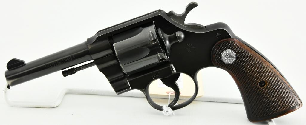 Clean Colt Official Police Revolver .38 Special: Here We Have a Clean Colt Official Police Revolver Chambered in .38, 4" Barrel, Checkered Wood Grips, Serial #826023 and Dates to 1953. Serrated Trigger and Hammer, Overall in Excellent Condition.