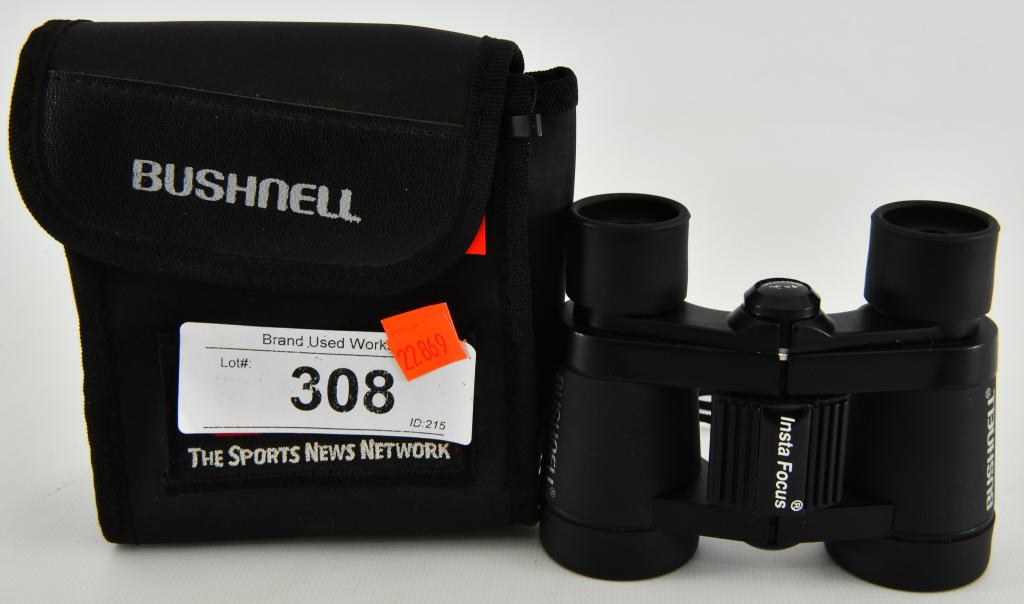 Bushnell Binoculars Insta Focus with Case: lot contains a real nice pair of Bushnell Binoculars Insta Focus with lanyard and case. In super nice pre owned condition. Lightweight binoculars with 4 x 30 magnification are perfect for spectator sp