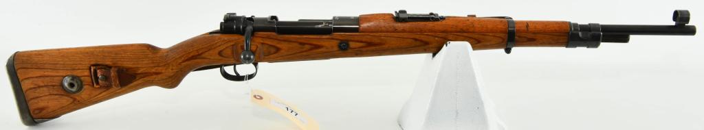German WWII Mountain Carbine Mauser G33/40: Up Next We Have a Rare and Desirable German WWII Mountain Carbine Mauser G33/40, This is an early 1942 dated G33/40 Mountain Carbine and dot Marked, Matching numbered Reciever and Bolt. The wood is a 
