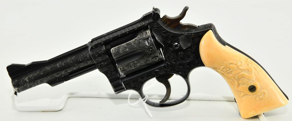 Stunning Engraved Smith Wesson Combat Masterpiece: Feast Your Eyes on This Stunning Engraved Smith & Wesson Combat Masterpiece Revolver With Etched "Iv" Bone Grips, Full Engraving Encompasses This Revolver, 4" Barrel, Case Color Serrated Trigger, and