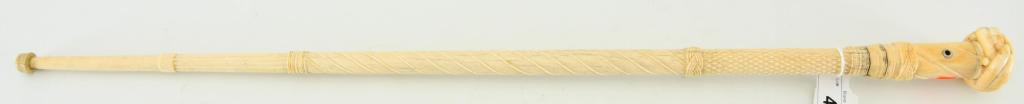 Rare Carved Whalebone & Sperm Walking Stick /Cane: Appears to be a Rare Carved Whalebone and Sperm Whale Ivory Sailors Walking Stick / Cane approx 30" in length, tapering bone shaft carved with alternate barley twist design, fluted stock and marine iv