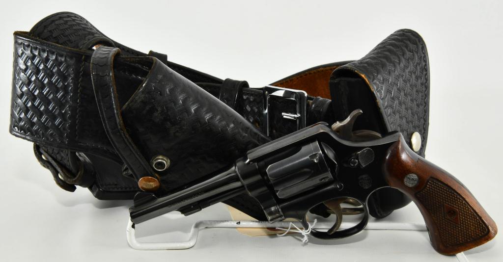 Smith & Wesson Military & Police Revolver .38 SPL: Up Next We Have a Smith & Wesson Military & Police Revolver Chambered in .38 Special, 4" Barrel, Smooth Trigger, Cross Hatched Hammer, and Diamond Checkered Grips With S&W Medallions, Serial # 376965,