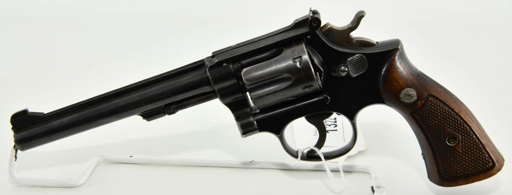 Smith & Wesson Model K-22 Revolver .22 LR: Up Next We Have a Smith & Wesson Model K-22 Revolver Chambered in .22 LR, With a 6" Barrel, 6 Shot Cylinder, Serial # K382 With Scarce LERK (Large Ejector Rod Knob) Original Diamond Checkered Wood Gri