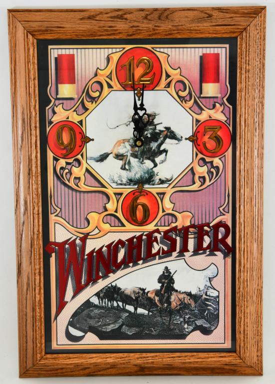 Rare Vintage WINCHESTER wall Clock: Rare and Hard to find Vintage Winchester Wall Clock - back of clock shows "Promotional Images" Framed in Solid Oak measures approx 18.5" in height by 12.5" wide battery operated Clock, appears in over