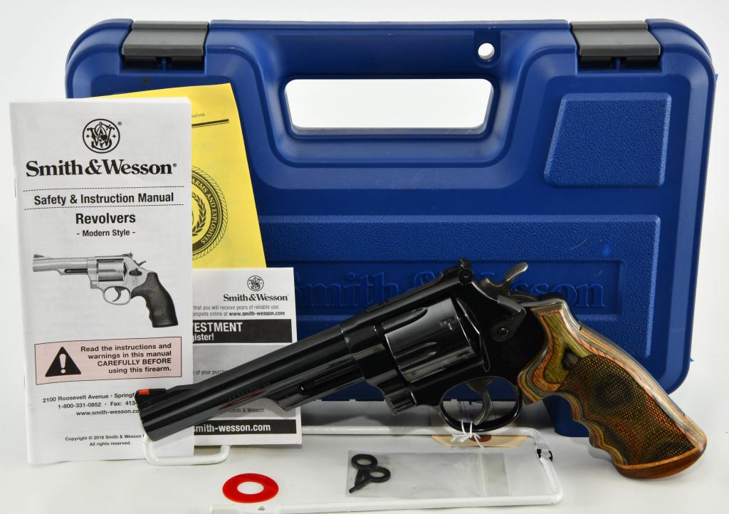 Smith & Wesson Model 57-6 .41 Magnum: Up Next is an absolute Beauty! Here we have a Clean Smith & Wesson Model 57 Classic Chambered in .41 Magnum and comes in the Original Factory Blue Hardcase. Equipped With a Hogue Cylinder Release, The