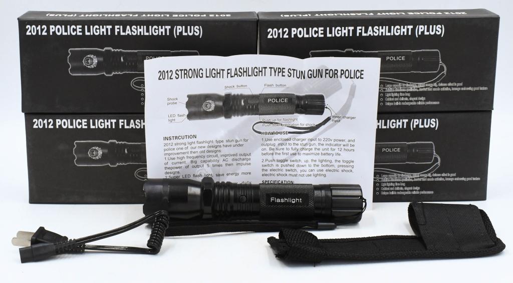 4 New Police Light Flashlight (Plus) Taser 2012: 4 New Police Light Flashlight (Plus) Taser 2012 Large capacity dc discharge output energy, aviation aluminum qualitative, Jungul hard anode oxidation, lozenge embossing good texture, light lighting ti