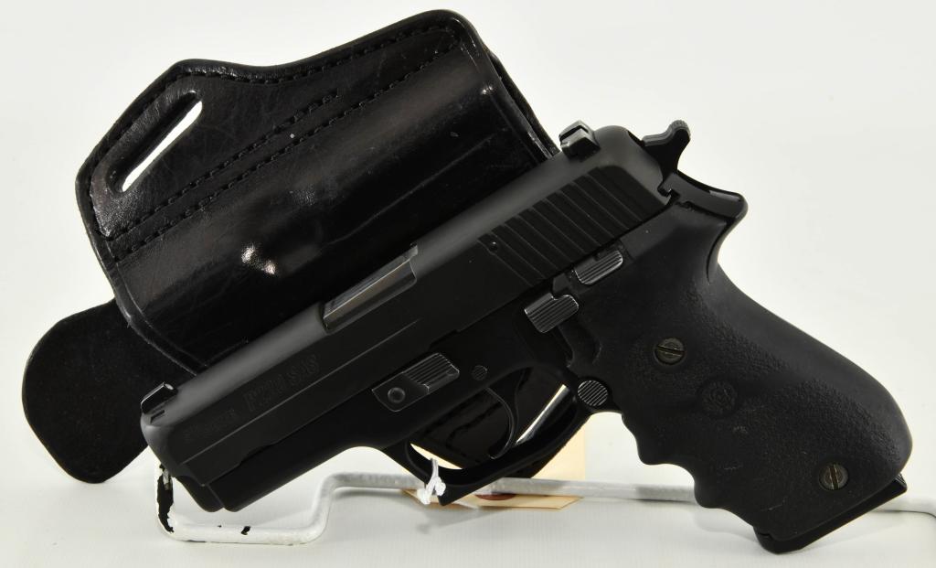 Sig Sauer P220 SAS Full Size Semi Auto .45 ACP: Up Next We Have a Sig Sauer P220 SAS Full Size Semi Auto Pistol Chambered in .45 ACP, Made in Germany, It Comes With One Magazine, Hogue Grips, and a Ryan Grizzle Leather Holster, Overall Appears in E