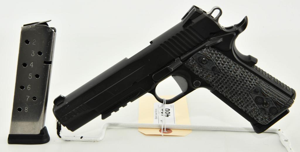 SIG Sauer 1911 TacOps Semi Auto Pistol .45 ACP: Up Next We Have a SIG Sauer 1911 Tactical Operations Semi Automatic Pistol Chambered in .45 ACP, 5" Barrel, Comes With Two 8 Round Magazines, Ergo XT Grips, Black Nitron Finish, Novak Night Sights, an