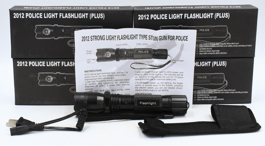 4 New Police Light Flashlight (Plus) Taser 2012: 4 New Police Light Flashlight (Plus) Taser 2012 Large capacity dc discharge output energy, aviation aluminum qualitative, Jungul hard anode oxidation, lozenge embossing good texture, light lighting ti