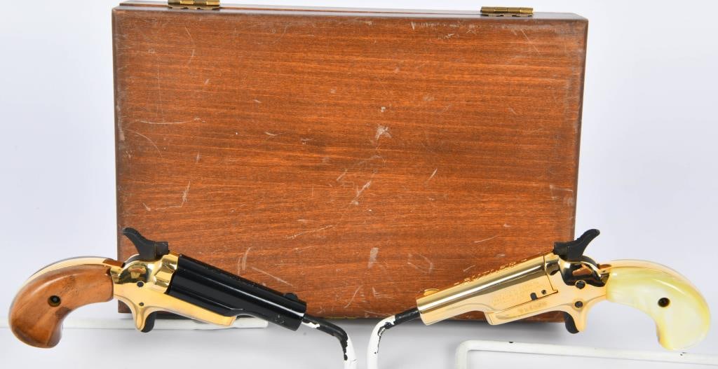 Cased Set of Butler Assoc. Garter Gun Derringers: Up Next We Have a Cased Set of Butler Assoc. Garter Gun Derringers, One in Gold With Pearl Grips, and One in Black and Gold With Wood Grips. Overall APpear in Great Pre-owned Condition. Consecutivce S
