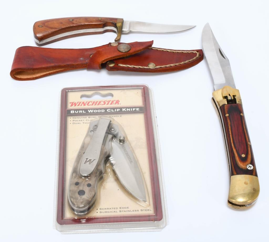3 Various Size Fixed Blade & Folding Pocket Knives: 3 Various Size Fixed Blade & Folding Pocket Knives, Inlcudes 1 Brand New In Package Winchester Burl Wood Clip Knife , 1 Fixed Blade Knife With Leather Sheath, & 1 Flip Folding Pocket Knife