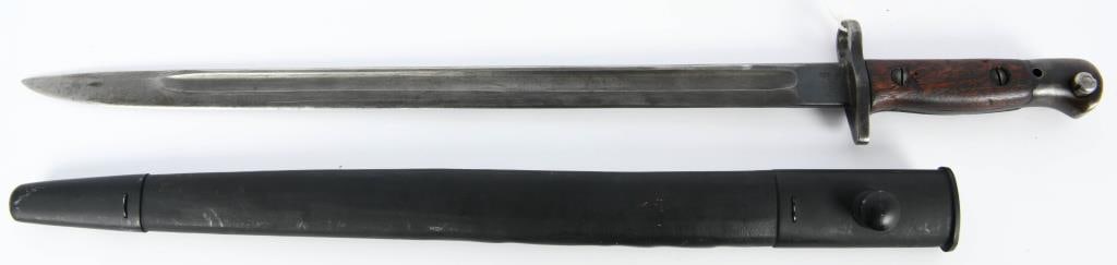 British 1907 Enfield Bayonet & Scabbard: British 1907 Enfield Bayonet & Scabbard, Has Various Markings On The Blade , Appears in Overall Good Condition Marked 1907 Release Button Works Properly