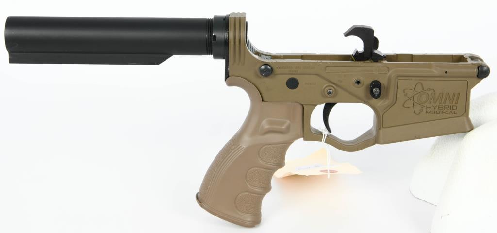 ATI Omni Hybrid Multi Cal Complete Lower Receiver: Now up for auction is the ATI Omni Hybrid Multi Cal Complete Lower Receiver in Flat Dark Earth (FDE). This comprehensive lower receiver is designed to accommodate multiple calibers, adding versatility