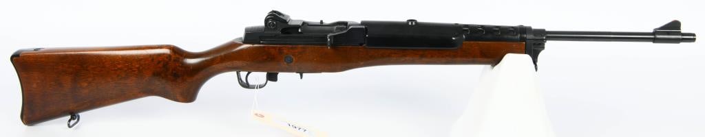 Ruger Mini-14 Semi-Automatic Rifle .223: Presenting the Ruger Mini-14 Semi-Automatic Rifle, a classic firearm chambered in .223 that pays homage to traditional aesthetics with its timeless wood stock, complemented by a black barrel and recei
