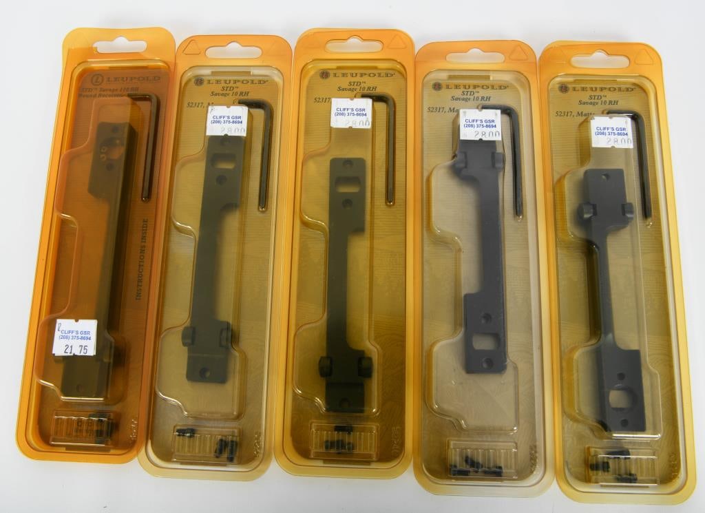 5 New In Package Leupold Scope Mount Bases: Elevate your optics setup with our exclusive auction featuring 5 new Leupold Scope Mount Bases conveniently packaged for your firearm needs. This lot includes four bases crafted for Standard Savage 10