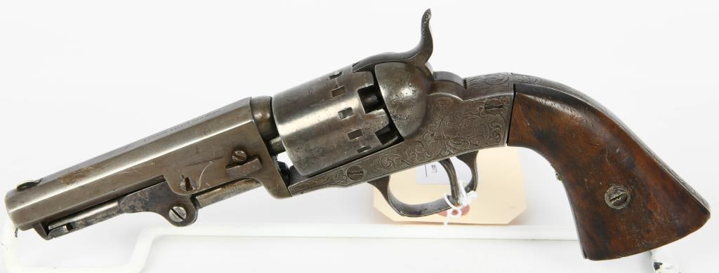 Engraved Antique London Cap & Ball Revolver .31: Antique Elegance: Engraved London Cap & Ball Revolver in .31 Caliber Step back in time with the Engraved Antique London Cap & Ball Revolver, a captivating relic from the past chambered in .31 Caliber.