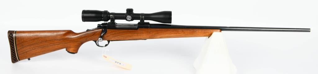 Ruger M77 Bolt Action Rifle 7MM Rem Mag: Here we have a Ruger M77 Bolt Action Rifle Chambered in 7MM Rem Mag, With the desirible Tang Safety, 24" Barrel, and Topped with a Bushnell Scope. Serial # 79-61698