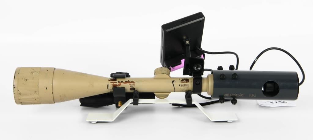 Bushnell Riflescope equipped w/camera & Flashlite: Lot contains a Bushnell Riflescope equipped with a camera system and flashlite., please refer to pictures, we have not tested unit but appears to be a cool concept for the Hunting day. approx length i