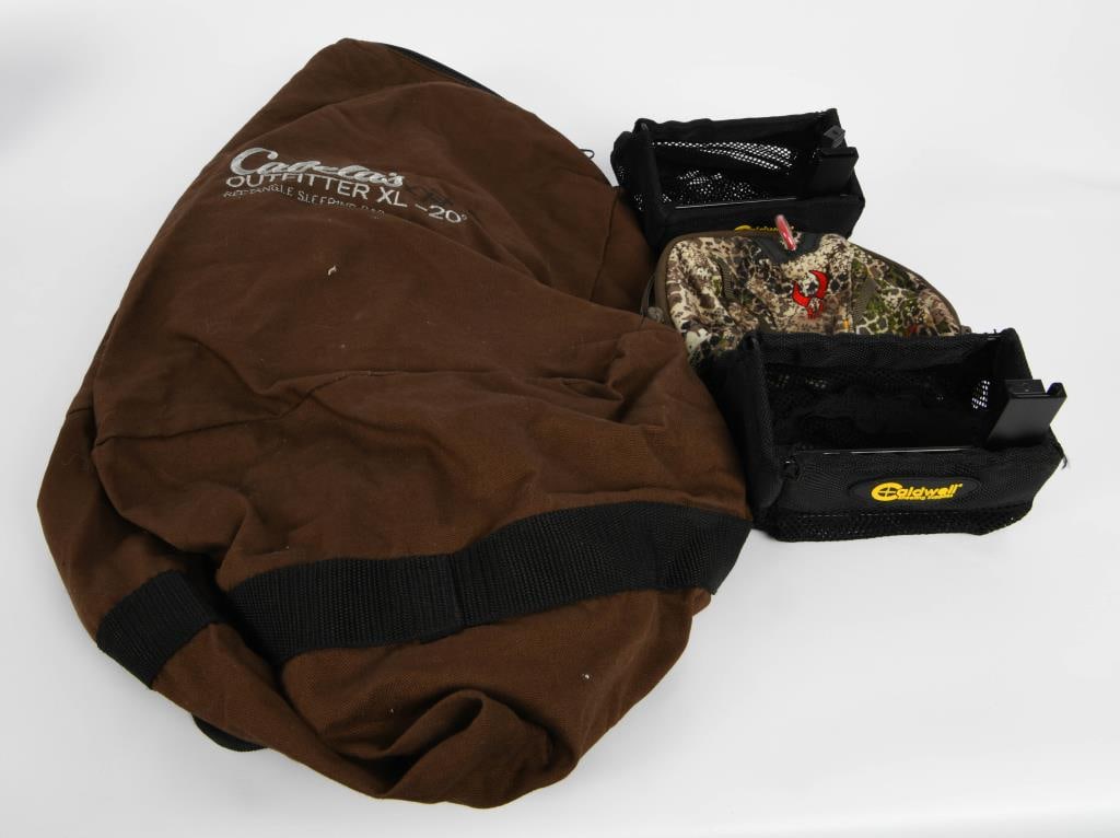 Cabela's XL Duffle Bag, Caldwell & Badlands: Lot contains some great misc items for your bidding pleasure, there is a real nice pre owned Cabela's Outfitter XL -20 Duffle Bag brown color with an approx measure of 28" across by 20" high, with can
