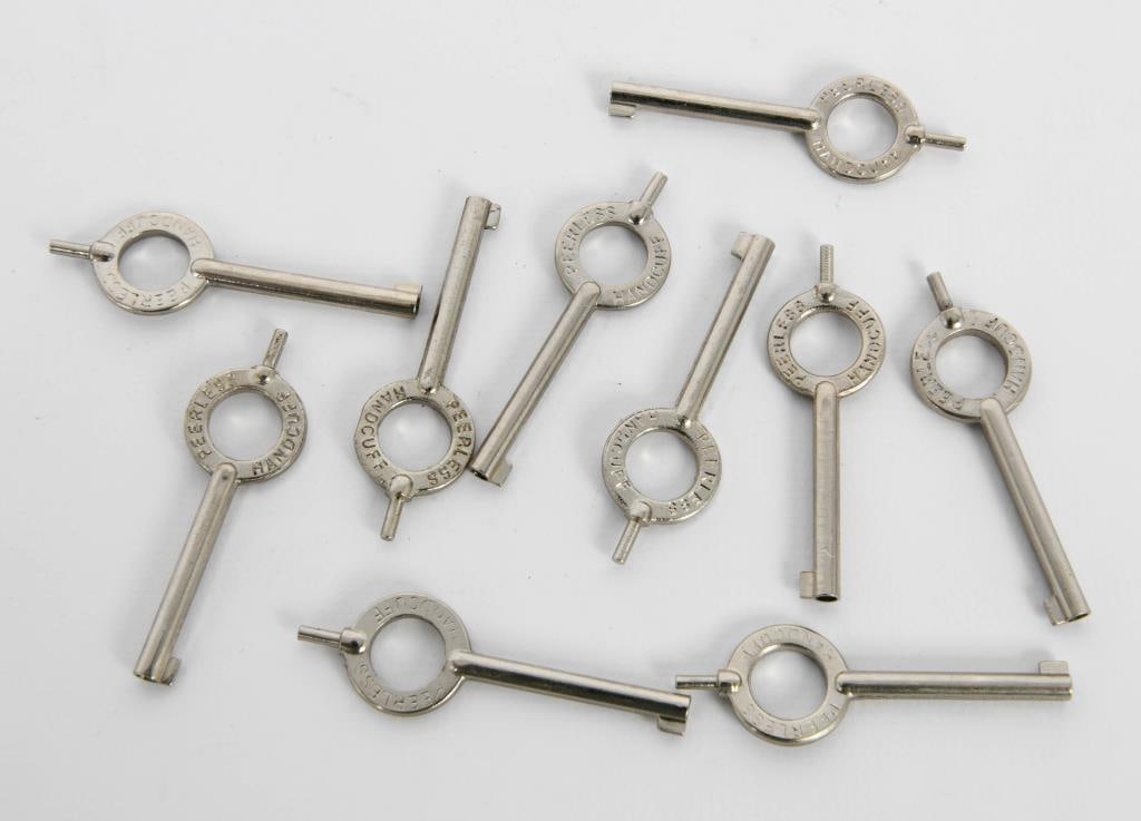 (10) Peerless Standard Handcuff Keys: Standard size handcuff key. Small and lightweight. Compatible with all standard handcuff locking mechanisms. Weight: 1 oz. Minimum inside perimeter: n/a Material/Finish: Alloy Steel Maximum inside per