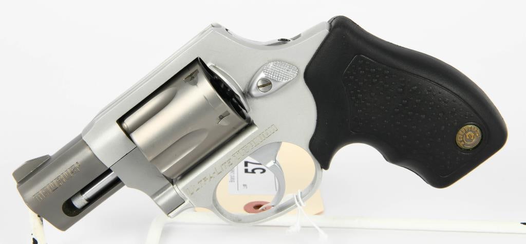 Taurus Ultra Lite Titanium Revolver .38 Special: Here We Have a Taurus Ultra Lite Titanium Revolver Chambered in .38 Special, Hammerless WIth a 5 Shot Cylinder, 2" Barrel, Very Lightweight, Great Purse Gun For The Wife!