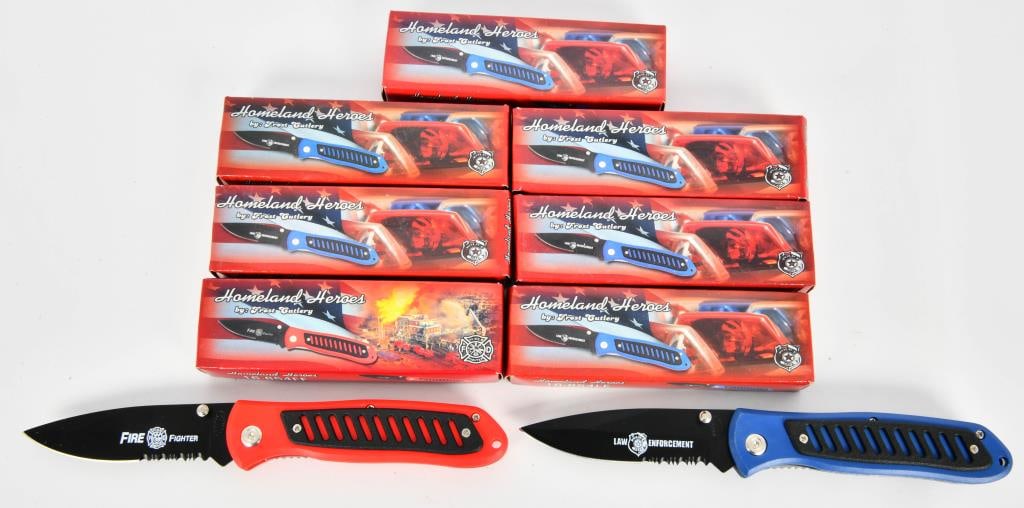 Lot of 7 New Frost Cutlery Homeland Heroes Knives: Lot of 7 Brand New Frost Cutlery Homeland Heroes Folding Knives. (Approx.) 4 1/2" Closed Lockback Folding Knife, Stainless Steel Blade, 1/2" Serrated Blade, ABS Handle with Lanyard Hole.