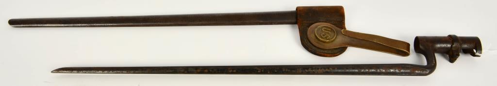 US M1873 Trapdoor Socket Bayonet w/ Scabbard: US M1873 Trapdoor Socket Bayonet with scabbard and frog. The 18" blade appears in nice condition shows signs of use and wear and some rust marks, comes with US over T on the ricasso. The neck shows mi