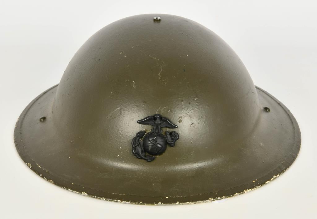 USMC Helmet WWI M1917 Steel Helmet Repro: US USMC Helmet WW1 M1917 Steel Helmet With Marine Corps USMC Eagle Badge- This could be a repro, the Helmet looks to be a legitimate helmet but was possibly revurbished. please refer to pictures when 