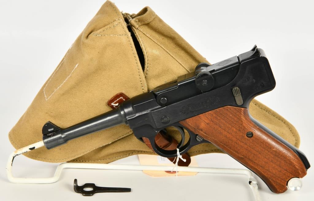 Stoeger Luger Semi Auto Pistol .22 LR: Up Next We Have a Stoeger Luger Semi Auto Pistol Chambered in .22 LR, and Comes With One Magazine, Smooth Wood Grips, Comes With a Canvas German Repro Holster, and Appears in Excellent Condition. This