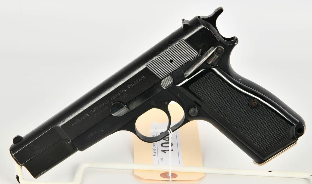 FN Belgium Browning Hi-Power Semi Auto Pistol 9MM: Up Next we have a FN Belgium Browning Hi-Power Semi Auto Pistol Chambered in 9MM, Serial 215RN30507, Dates to 1979, Comes with One Aftermarket Magazine, and this Pistol appears in Good Condition, The 