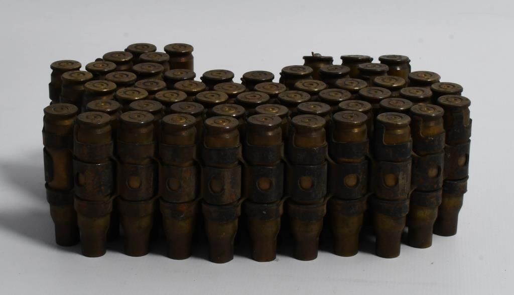 54 Count Of Linked Empty .308 Brass Casings: Hello bidders! On auction are 54 linked empty .308 brass casings, perfect for reloading enthusiasts.
