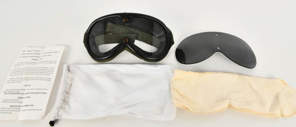 Pair Of 1974 Military Sun/Wind/Dust Goggles: Greetings esteemed bidders! Up for auction is a pair of 1974 military sun/wind/dust goggles, complete with an extra lens. These goggles, designed for versatile use in varying conditions, are a testame