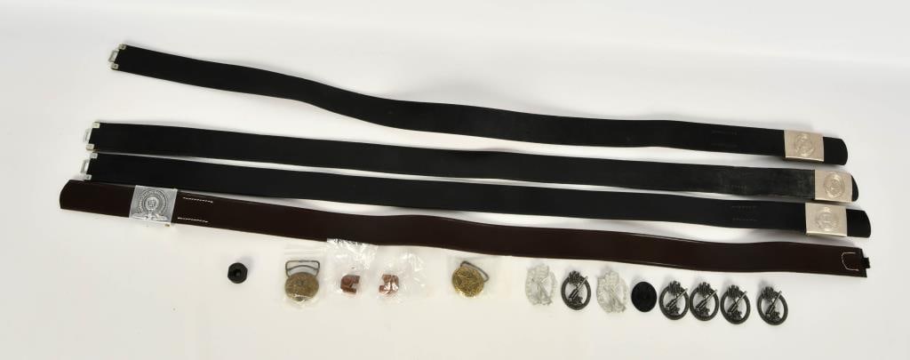 4 East Germany Belts/Belt Bucks W/ German Badges: Hello Bidders! Up for auction is a lot containing 4 East German leather belts with belt buckles, accompanied by a collection of various German anti-aircraft flak badges.