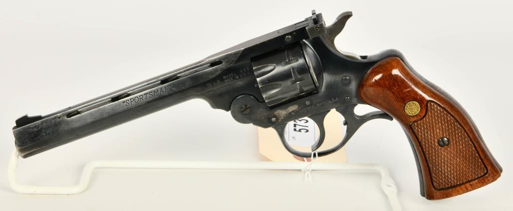 H&R Model 999 Sportsman 9 Shot Revolver: Up for auction is a Nice Harrington & Richardson Sportsman Model 999 Revolver Chambered in .22LR, this revolver has a 9 shot capacity, sports a 6" vent ribbed Barrel, has the original wood grips, and 
