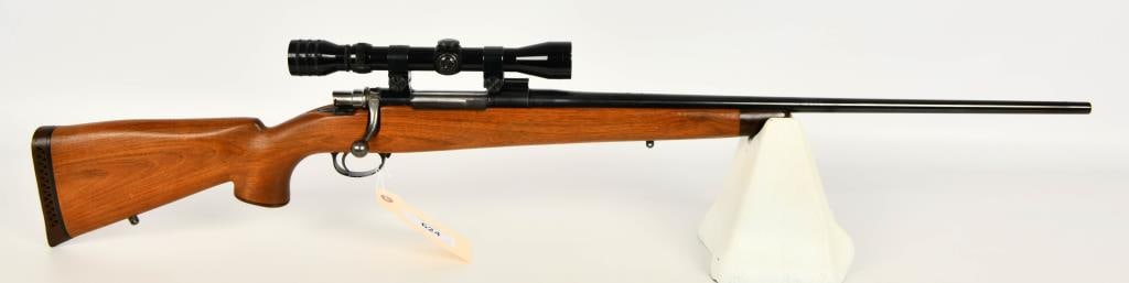 Belgian FN Action Sporter Rifle .243 Win: Up Next We Have a Belgian FN Action Sporter Rifle Chambered in .243 Win, 25" Barrel, and Topped With a Redfield Scope.