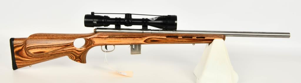 Left Hand Savage 93R17 Heavy Barrel .17 HMR Rifle: Up Next We Have a Nice Savage 93R17 Heavy Barrel Stainless Bolt Action Left Handed Rifle Chambered in .17 HMR, Equipped With a Nice Heavy Thumbhole Laminate Stock, Comes With One Magazine, and Topped 