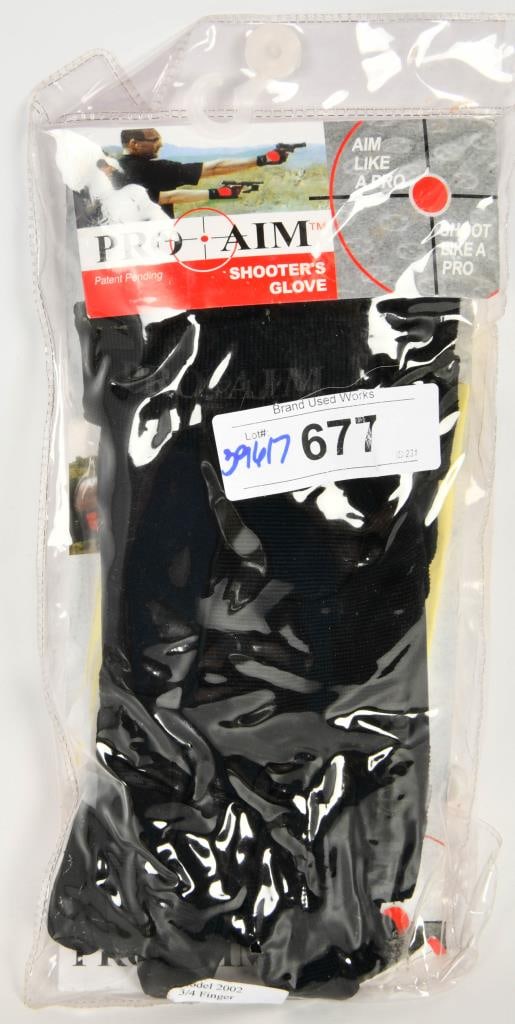 Pro AIM Shooters Gloves NIP Model 2002 Sz Large: New in the package, Pro Aim Shooters Gloves, a multi purpose glove that actually acts as a bench rest for your wrist, to help you maintain your accuracy while at the same time provide a shock absorbin