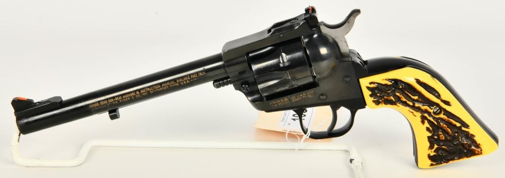 Ruger New Model Single Six Revolver .32 H&R Magnum: Up Next We Have a Ruger New Model Single Six Revolver Chambered in .32 H&R Magnum, Equipped WIth a 6 1/2" Barrel, Faux Stag Grips, Appearing in Excellent Condition, Serial # 650-13887.