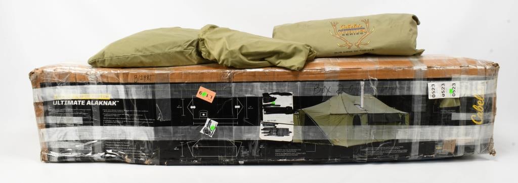 Cabela's ultimate Alaknak 12'x20' outfitter tent: Attention outdoor enthusiasts! Up for bid is a Cabela's Ultimate Alaknak 12'x20' Outfitter Tent, complete with poles. Known for its durability and spacious design, this tent is ideal for your next adv