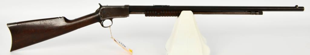 Winchester Model 1890 Slide Action Rifle .22 Long: Winchester Model 1890 Slide Action Takedown Rifle - A Classic in .22 Long from 1930 Step into the past with the Winchester Model 1890 Slide Action Rifle, chambered in .22 Long. With Mismatched serial
