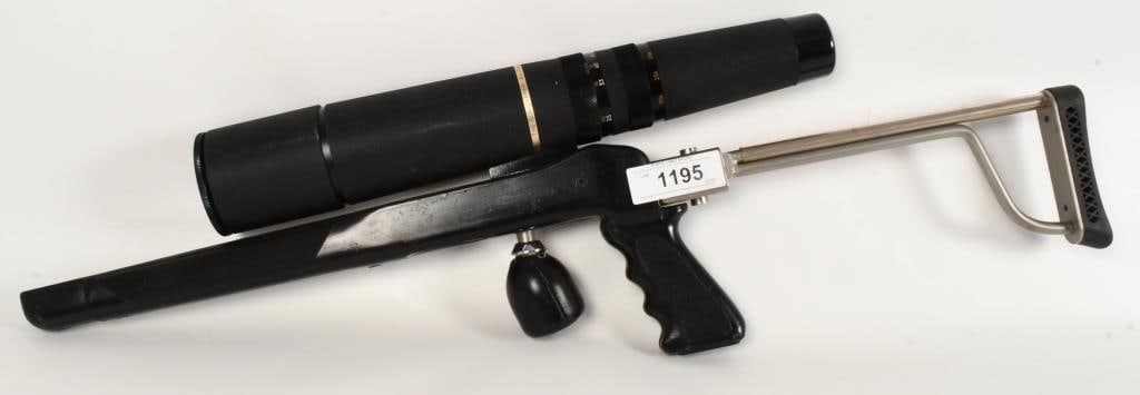 The Discover Bausch & Lomb Zoom 60mm Telescope: Telescope is mounted to a mock up stock. Includes Bausch & Lomb Discoverer Telephoto Adapter, Camera Adapter T-System Accessory. Also includes a Tiffen Lens Filter Case. Length of the telescope is app